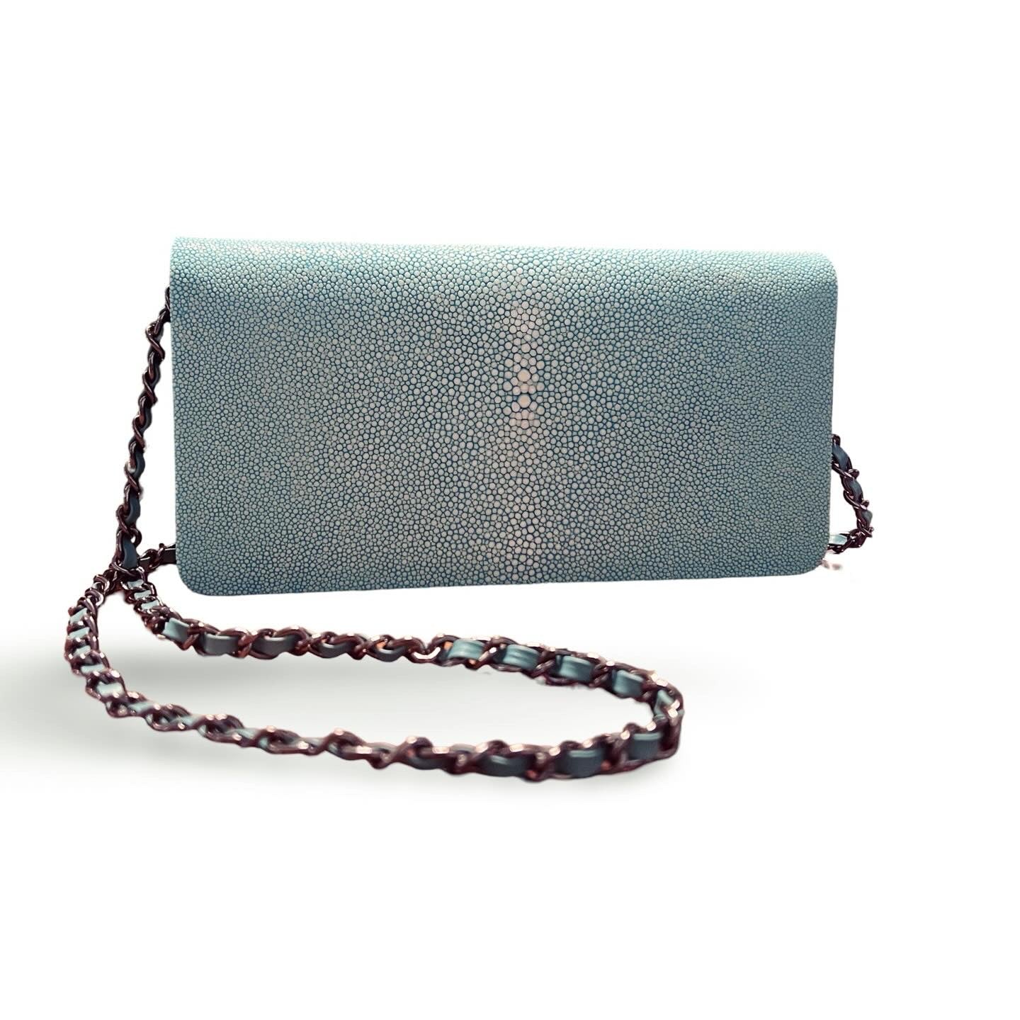 Blue and silver clutch bag on sale