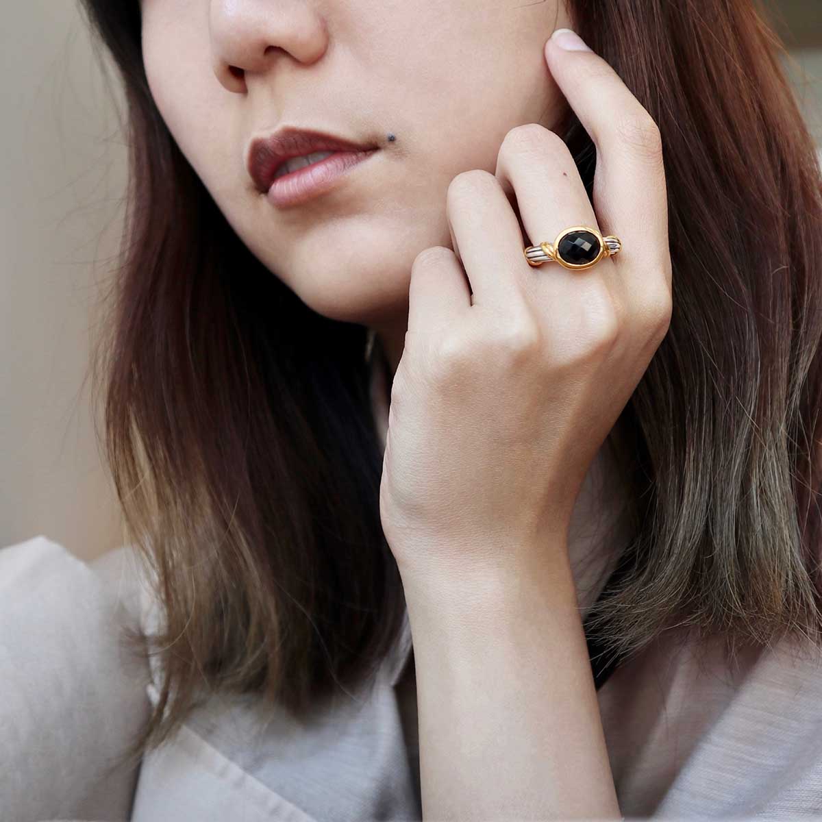 Fantasies Black Onyx Oval Bezel Set Ring in two tone sterling silver