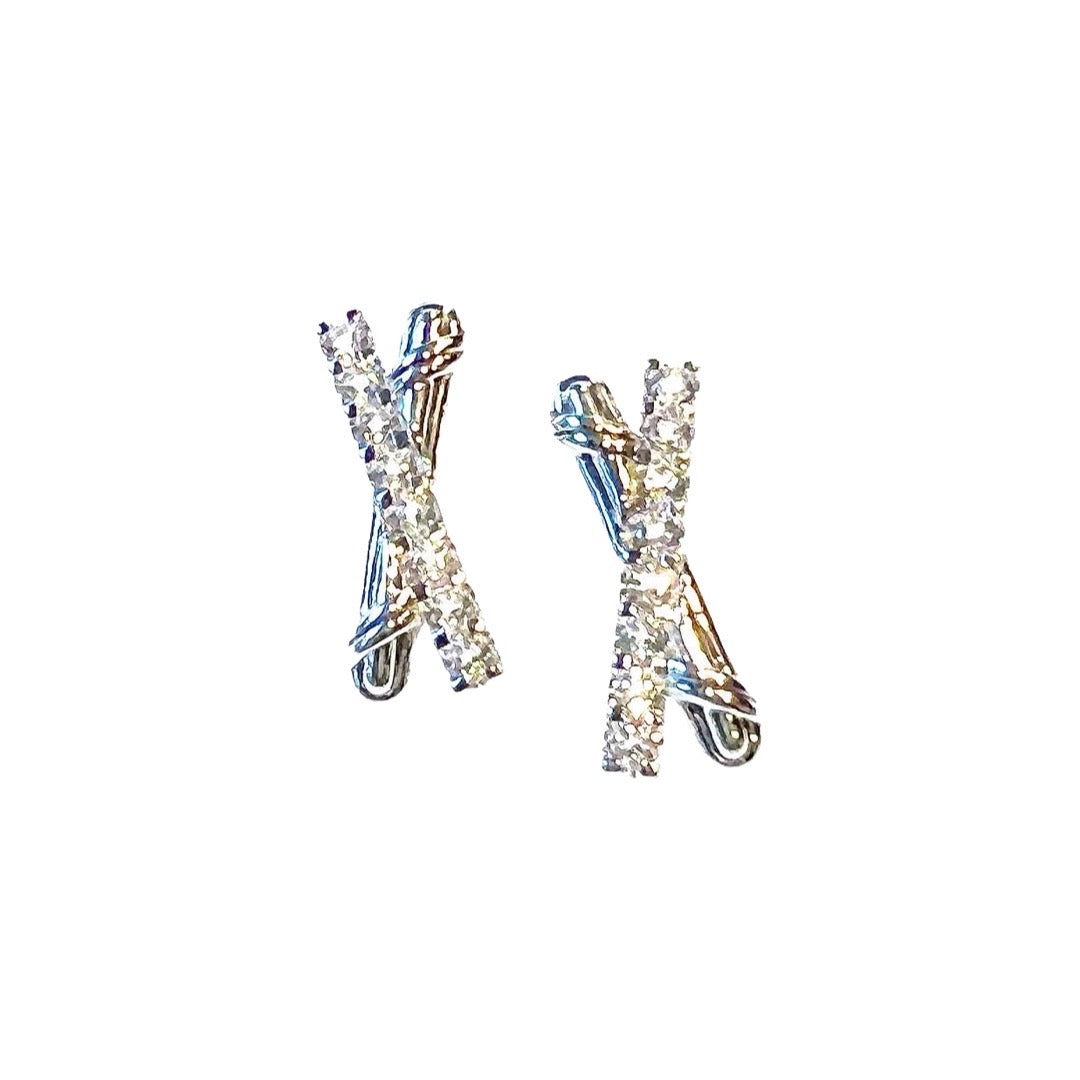 Signature Classic Criss Cross Earrings in sterling silver with white topaz